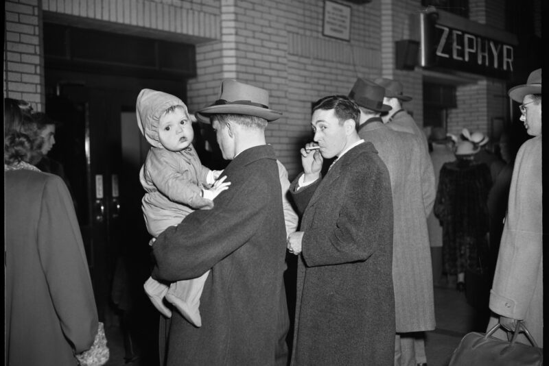 Historic photo of Union Depot travelers with baby and dad
