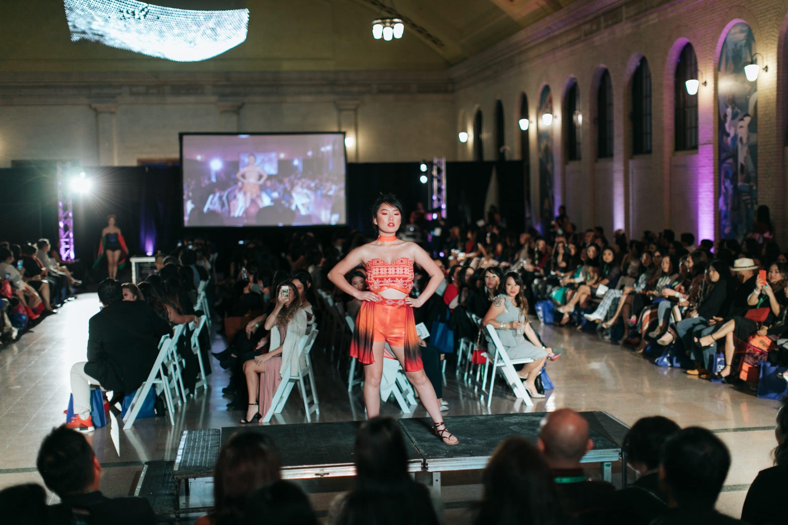 Model standing in Waiting Room for fashion show