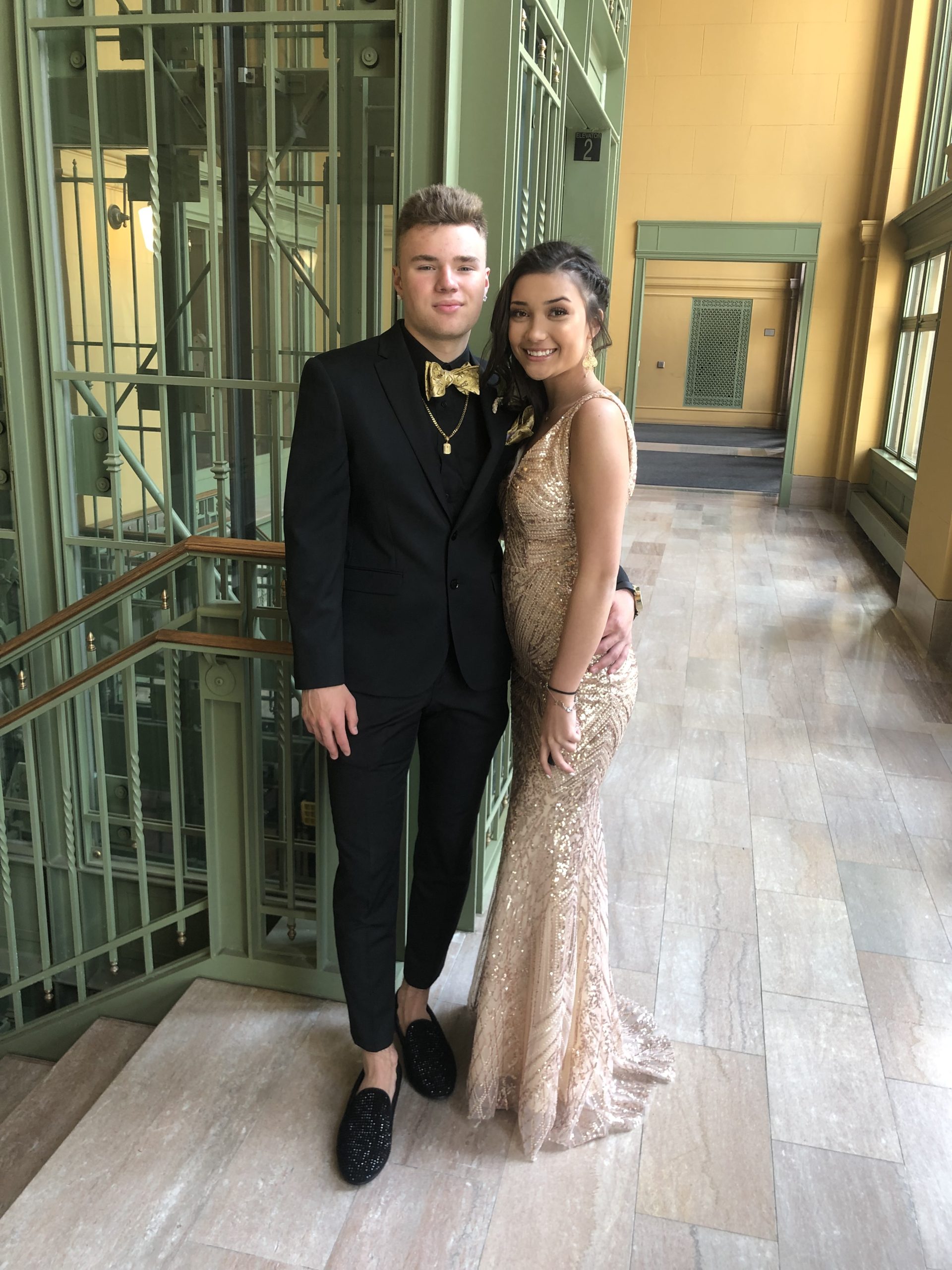 A prom couple standing in the Union Depot vestibule