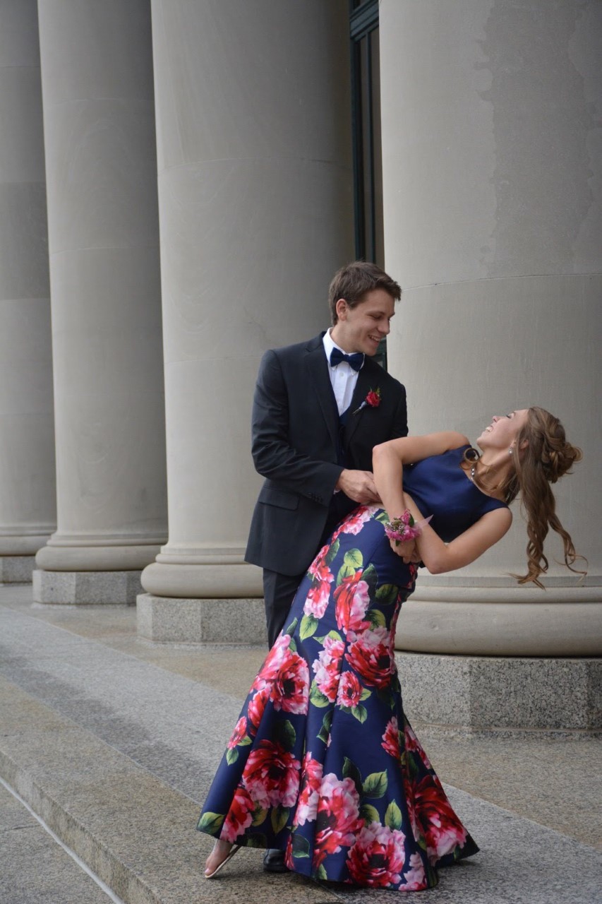 A school dance couple standing in front of the Union Depot head house